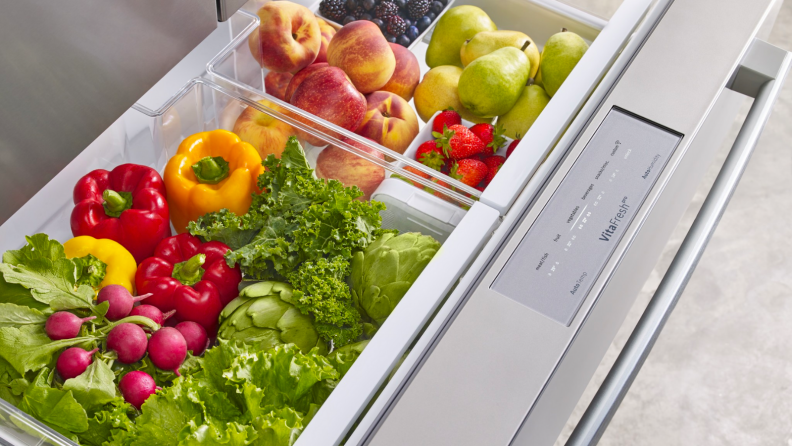 Fresh produce in crisper draw in refrigerator.